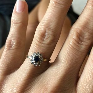 10 kt gold stamped, diamond & black onyx ring